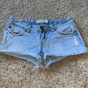light wash distressed jeans shorts